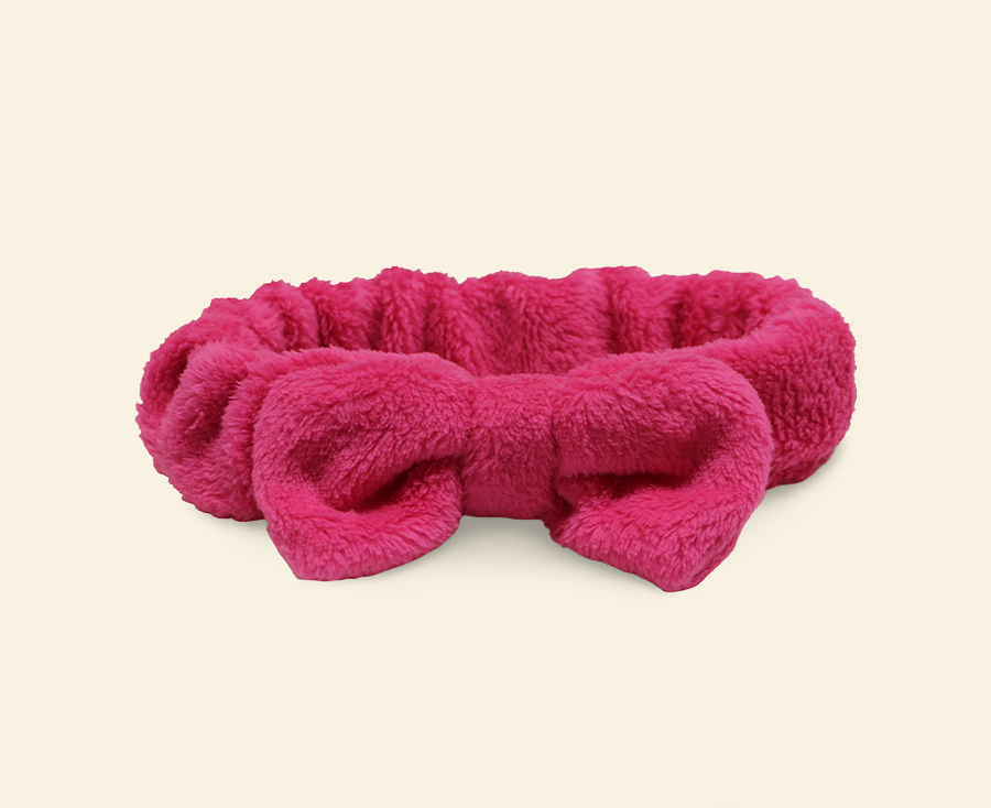 Tiara atoalhada pink com laço